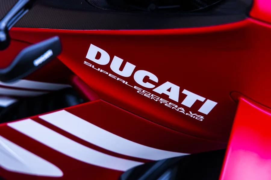 Close view of the Ducati Superleggera V4 Centenario in the Rosso Centenario livery